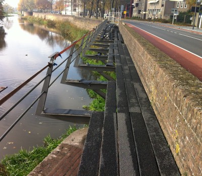 Vervangen houten delen voetgangers- fietsbrug inclusief slijtlaag dek