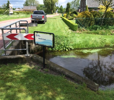 Aanleg duiker in beek inclusief tijdelijk ompompen beek